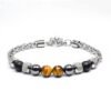 2026/05/1000077072.jpg Bracelet œil de Tigre, Onyx & Hématite