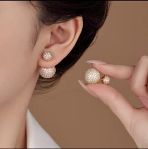 Boucles d'oreilles double face zircons dorées