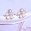 2026/07/1000137843.jpg Parure fleur perle véritable dorée