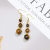 Boucles pendantes trio œil de tigre