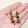 Boucles pendantes trio œil de tigre