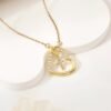 2026/09/1000157650-1.jpg Collier cœur croix zircons