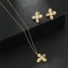 Parure fleur perle acier