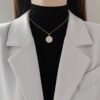 2026/09/1000219914.jpg Collier croix pendentif nacre