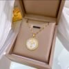 2026/09/1000219922.jpg Collier croix pendentif nacre