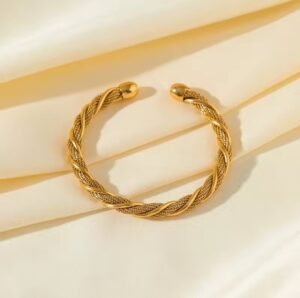 Bracelet jonc torsadé maille dorée