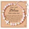 2026/09/1000220492.jpg Bracelet perles roses croix nacrée