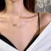 screenshot-14 Collier pendentif zircons en acier